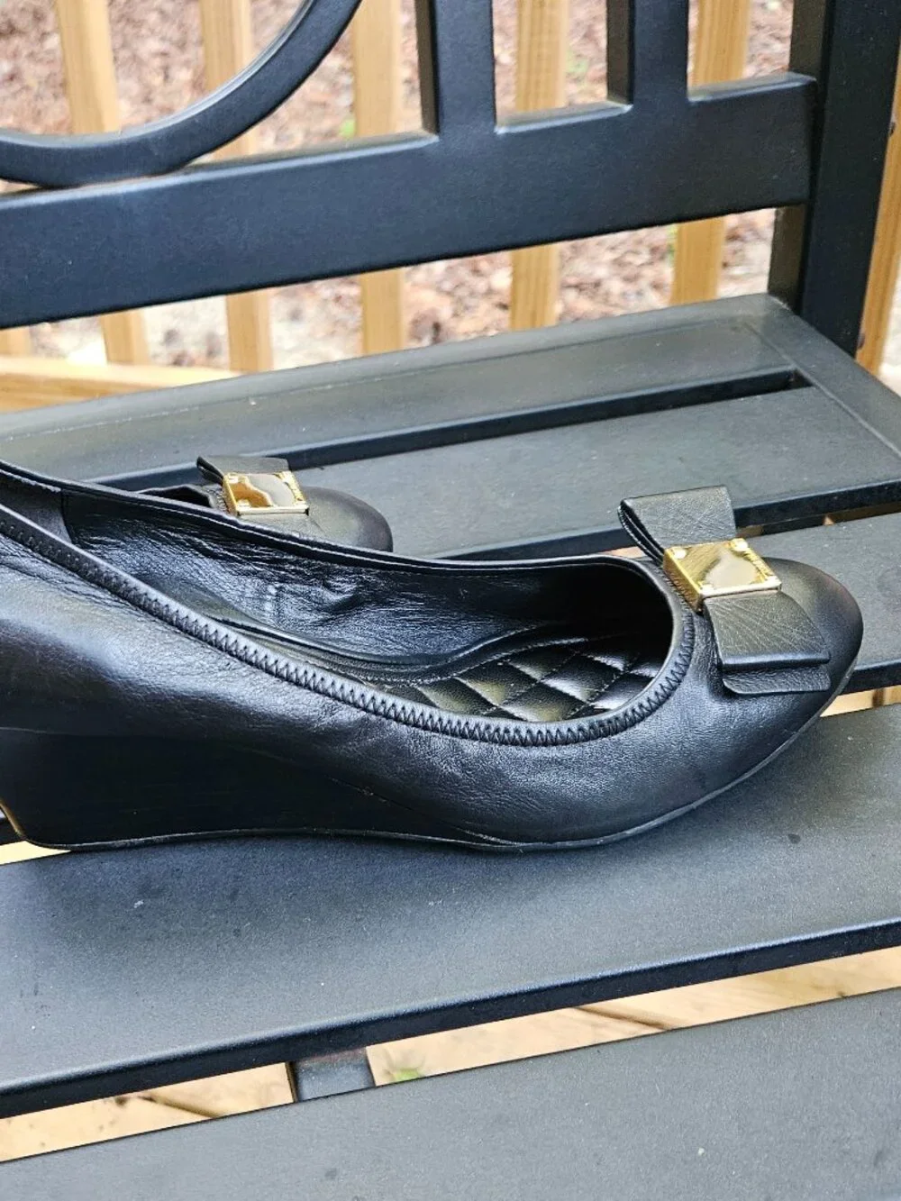 Cole Haan Black Leather Wedge Pumps with Gold Bow Accent